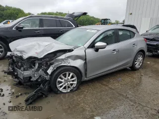 2014 Mazda 3 i Touring with VIN JM1BM1L72E1171006, listed as a Copart auction lot 57693715 with 116,233 mi miles and Salvage title. Bid and sale history available at DreamBid. Image 1.