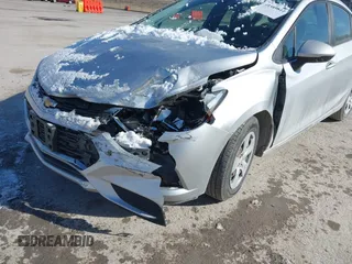 2018 Chevrolet Cruze LS with VIN 1G1BC5SM9J7129241, listed as a IAAI auction lot 41589811 with 66,721 mi miles and . Bid and sale history available at DreamBid. Image 6.