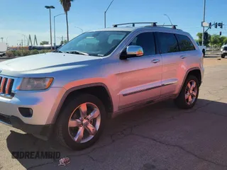 2011 Jeep Grand Cherokee Overland with VIN 1J4RR6GG7BC745066, listed as a Copart auction lot 66415905 with 164,264 mi miles and Clean title. Bid and sale history available at DreamBid. Image 2.