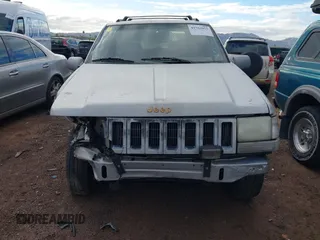 1995 Jeep Grand Cherokee Limited with VIN 1J4GZ78Y3SC649231, listed as a IAAI auction lot 41763953 with 140,889 mi miles. Bid and sale history available at carsss.com. Image 12.