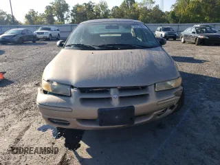 1999 Dodge Stratus z VIN 1B3EJ46X0XN684268, wystawiony jako Copart lot #70312664 z przebiegiem 140 711 mil mil oraz Szkoda całkowita • Salvage title. Historia ofert i sprzedaży dostępna na DreamBid. Obrazek 5.