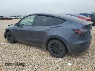 2022 Tesla Model Y Long Range z VIN 7SAYGAEE4NF543503, wystawiony jako Copart lot #47143155 z przebiegiem 53 874 mil mil oraz Szkody całkowita. Historia ofert i sprzedaży dostępna na DreamBid. Obrazek 2.