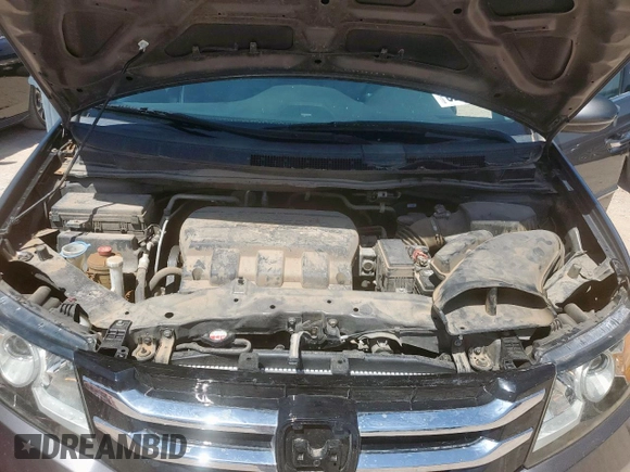 2015 Honda Odyssey Touring Elite z VIN 5FNRL5H97FB002739, wystawiony jako Copart lot #62060695 z przebiegiem 194 604 mil mil oraz Szkoda całkowita • Salvage title. Historia ofert i sprzedaży dostępna na DreamBid. Obrazek 12.