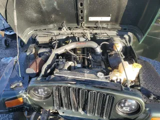 1997 Jeep Wrangler Sahara with VIN 1J4FY49S4VP507006, listed as a Copart auction lot 82319014 with 134,582 mi miles and Salvage Title. Bid and sale history available at carsss.com. Image 12.