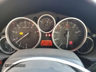 2007 Mazda MX-5 Miata Sport z VIN JM1NC25F970124896, wystawiony jako Copart lot #83624394 z przebiegiem 62 735 mil mil oraz Szkoda całkowita • Salvage title. Historia ofert i sprzedaży dostępna na DreamBid. Obrazek 9.