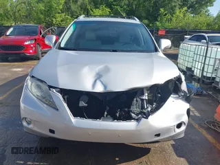 2012 Lexus RX 350 z VIN 2T2BK1BA5CC129663, wystawiony jako IAAI lot #42198701 z przebiegiem 156 525 mil mil oraz . Historia ofert i sprzedaży dostępna na DreamBid. Obrazek 13.
