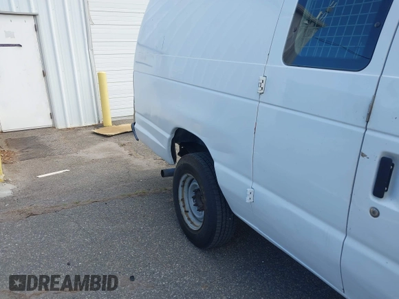 2011 Ford Econoline Cargo Commercial with VIN 1FTSS3EL1BDA24066, listed as a IAAI auction lot 42165525 with 156,651 mi miles. Bid and sale history available at carsss.com. Image 6.