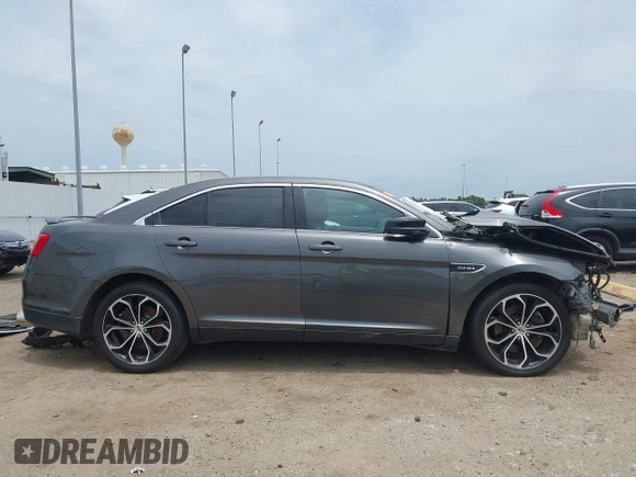 2015 Ford Taurus SHO with VIN 1FAHP2KT9FG114036, listed as a IAAI auction lot 42227276 with 146,285 mi miles and . Bid and sale history available at DreamBid. Image 14.