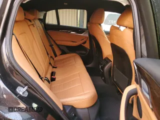 2019 BMW X4 xDrive30i z VIN 5UXUJ3C51KLG55813, wystawiony jako Copart lot #69686622 z przebiegiem 42 382 mil mil oraz . Historia ofert i sprzedaży dostępna na DreamBid. Obrazek 11.