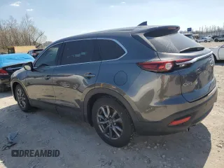 2021 Mazda CX-9 Touring z VIN JM3TCACY5M0500924, wystawiony jako Copart lot #50654505 z przebiegiem 57 067 mil mil oraz Szkoda całkowita • Salvage title. Historia ofert i sprzedaży dostępna na DreamBid. Obrazek 2.