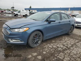 2018 Ford Fusion SE z VIN 3FA6P0H79JR159534, wystawiony jako Copart lot #57490145 z przebiegiem 286 982 mil mil oraz Tytuł czysty. Historia ofert i sprzedaży dostępna na DreamBid. Obrazek 1.