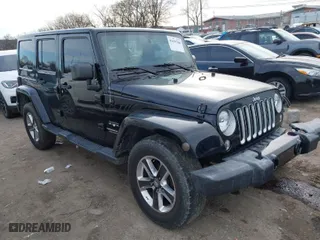 2016 Jeep Wrangler Unlimited 75th Anniversary with VIN 1C4BJWEG1GL221873, listed as a IAAI auction lot 41635788 with 148,493 mi miles. Bid and sale history available at carsss.com. Image 1.