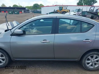 2012 Nissan Versa SV with VIN 3N1CN7APXCL812936, listed as a IAAI auction lot 42533280 with 78,071 mi miles and . Bid and sale history available at DreamBid. Image 15.