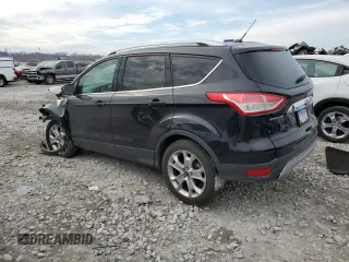 2014 Ford Escape Titanium with VIN 1FMCU0JX6EUB78701, listed as a Copart auction lot 50612945 with 105,729 mi miles and Salvage Title. Bid and sale history available at carsss.com. Image 2.