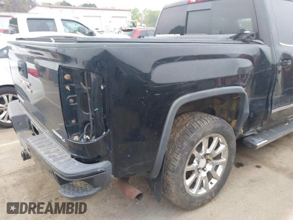 2014 GMC Sierra 1500 Denali z VIN 3GTU2WEJ0EG319322, wystawiony jako IAAI lot #41947884 z przebiegiem 216 063 mil mil oraz . Historia ofert i sprzedaży dostępna na DreamBid. Obrazek 12.