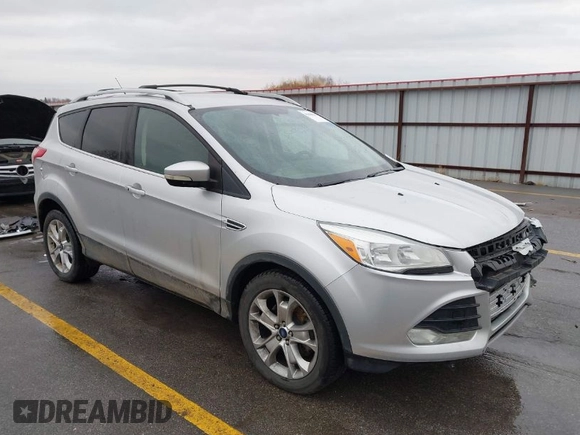 2015 Ford Escape Titanium with VIN 1FMCU9J97FUA84589, listed as a IAAI auction lot 41688156 with 129,073 mi miles. Bid and sale history available at carsss.com. Image 1.