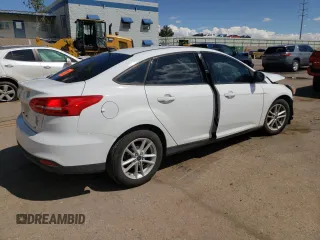 2017 Ford Focus SE with VIN 1FADP3F21HL300654, listed as a Copart auction lot 55987305 with Not provided miles and Salvage title. Bid and sale history available at DreamBid. Image 3.