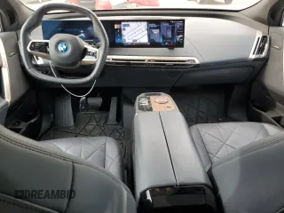 2023 BMW iX xDrive50 with VIN WB523CF01PCM76013, listed as a Copart auction lot 48326965 with 18,923 mi miles and Salvage Title. Bid and sale history available at carsss.com. Image 8.