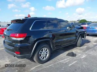 2020 Jeep Grand Cherokee Altitude with VIN 1C4RJEAG6LC341791, listed as a IAAI auction lot 39474396 with 80,726 mi miles and . Bid and sale history available at DreamBid. Image 4.