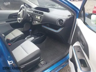2013 Toyota Prius c One with VIN JTDKDTB39D1058324, listed as a IAAI auction lot 41916103 with 68,079 mi miles. Bid and sale history available at carsss.com. Image 5.