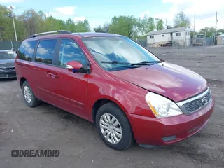 2012 Kia Sedona LX with VIN KNDMG4C76C6453523, listed as a IAAI auction lot 42189376 with 207,557 mi miles. Bid and sale history available at carsss.com. Image 1.