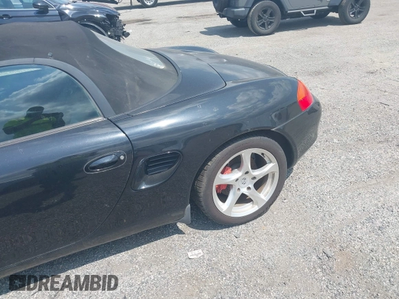 2002 Porsche Boxster S z VIN WP0CB29842U663272, wystawiony jako IAAI lot #42604562 z przebiegiem 68 927 mil mil oraz . Historia ofert i sprzedaży dostępna na DreamBid. Obrazek 6.