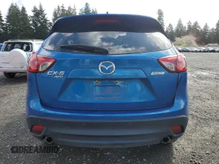 2014 Mazda CX-5 Touring with VIN JM3KE4CY3E0381134, listed as a Copart auction lot 52115015 with 52,162 mi miles and Salvage Title. Bid and sale history available at carsss.com. Image 6.