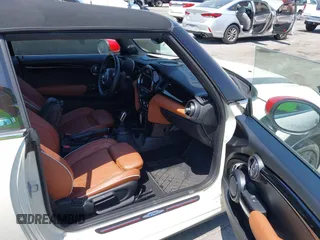 2021 MINI Convertible with VIN WMWWJ9C0XM3M07302, listed as a IAAI auction lot 42027854 with 30,921 mi miles and . Bid and sale history available at DreamBid. Image 5.