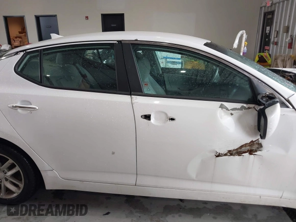 2013 Kia Optima LX with VIN 5XXGM4A72DG258725, listed as a IAAI auction lot 41981412 with 148,173 mi miles and . Bid and sale history available at carsss.com. Image 13.