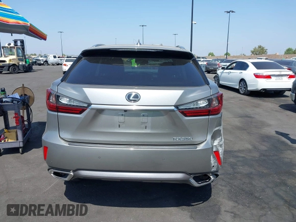 2017 Lexus RX 350 z VIN 2T2ZZMCA3HC041664, wystawiony jako IAAI lot #42379331 z przebiegiem 153 887 mil mil oraz . Historia ofert i sprzedaży dostępna na DreamBid. Obrazek 17.
