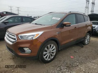 2017 Ford Escape Titanium with VIN 1FMCU0JD4HUC85921, listed as a Copart auction lot 51490945 with 90,093 mi miles and Salvage Title. Bid and sale history available at carsss.com. Image 1.