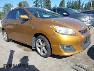 2009 Toyota Matrix S with VIN 2T1LE40E89C009775, listed as a IAAI auction lot 42086039 with 220,832 mi miles. Bid and sale history available at carsss.com. Image 1.