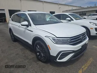 2024 Volkswagen Tiguan SE with VIN 3VV3B7AX5RM086820, listed as a IAAI auction lot 42751180 with 30,839 mi miles and . Bid and sale history available at DreamBid. Image 6.
