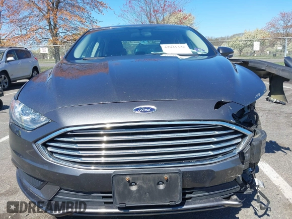 2017 Ford Fusion SE with VIN 3FA6P0H70HR107252, listed as a IAAI auction lot 42041332 with 121,255 mi miles. Bid and sale history available at carsss.com. Image 6.