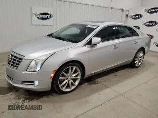 2013 Cadillac XTS Premium z VIN 2G61S5S30D9140891, wystawiony jako Copart lot #48751955 z przebiegiem 125 589 mil mil oraz Tytuł czysty. Historia ofert i sprzedaży dostępna na DreamBid. Obrazek 1.