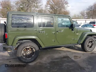 2016 Jeep Wrangler Unlimited Sahara with VIN 1C4BJWEGXGL249638, listed as a IAAI auction lot 41090024 with 98,345 mi miles and . Bid and sale history available at DreamBid. Image 14.
