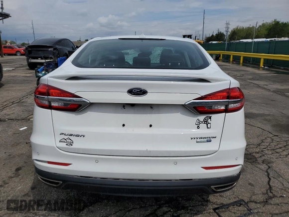 2020 Ford Fusion Titanium z VIN 3FA6P0D96LR205475, wystawiony jako Copart lot #56313075 z przebiegiem 30 888 mil mil oraz Szkoda całkowita • Salvage title. Historia ofert i sprzedaży dostępna na DreamBid. Obrazek 6.