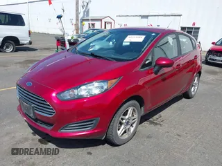 2017 Ford Fiesta SE z VIN 3FADP4EJ4HM168566, wystawiony jako IAAI lot #42223504 z przebiegiem 53 572 mil mil oraz . Historia ofert i sprzedaży dostępna na DreamBid. Obrazek 2.