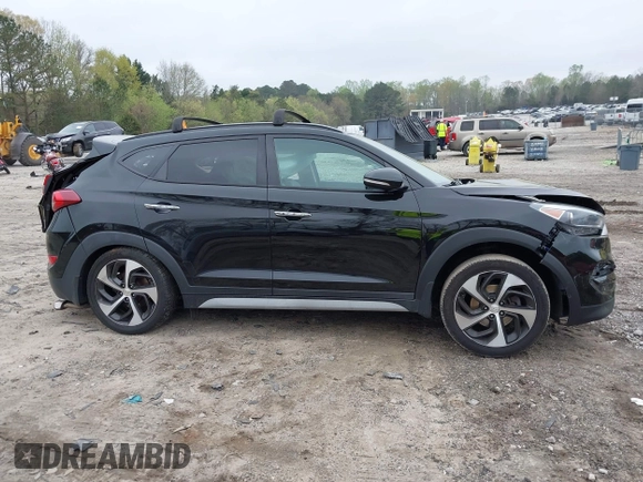 2017 Hyundai Tucson Value z VIN KM8J33A29HU369601, wystawiony jako IAAI lot #41947376 z przebiegiem 140 000 mil mil oraz . Historia ofert i sprzedaży dostępna na DreamBid. Obrazek 14.
