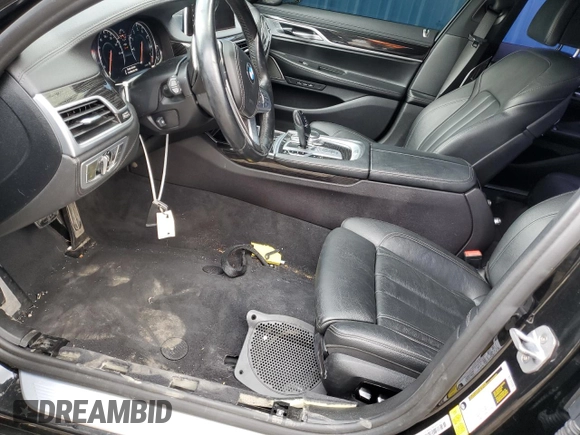 2019 BMW 7 Series 740i with VIN WBA7E2C57KB217455, listed as a Copart auction lot 69580773 with 74,717 mi miles and . Bid and sale history available at DreamBid. Image 7.
