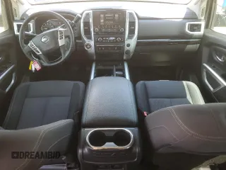 2021 Nissan Titan SV z VIN 1N6AA1EF6MN512596, wystawiony jako Copart lot #56140285 z przebiegiem 49 145 mil mil oraz Szkoda całkowita • Salvage title. Historia ofert i sprzedaży dostępna na DreamBid. Obrazek 8.