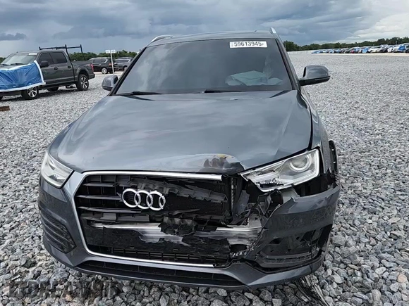 2018 Audi Q3 Premium z VIN WA1BCCFS3JR015478, wystawiony jako Copart lot #59613945 z przebiegiem 96 841 mil mil oraz Szkoda całkowita • Salvage title. Historia ofert i sprzedaży dostępna na DreamBid. Obrazek 14.