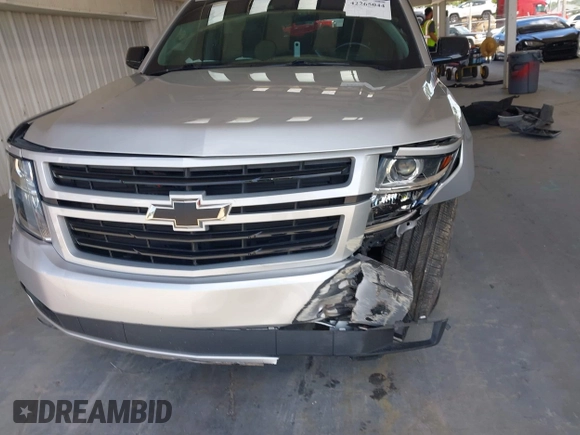 2019 Chevrolet Tahoe LT with VIN 1GNSCBKC0KR240660, listed as a IAAI auction lot 42265044 with 109,720 mi miles and . Bid and sale history available at DreamBid. Image 13.