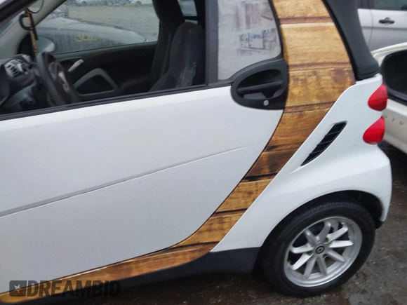 2009 Smart fortwo Passion with VIN WMEEK31X69K218783, listed as a IAAI auction lot 41604398 with Not Provided miles and . Bid and sale history available at DreamBid. Image 6.