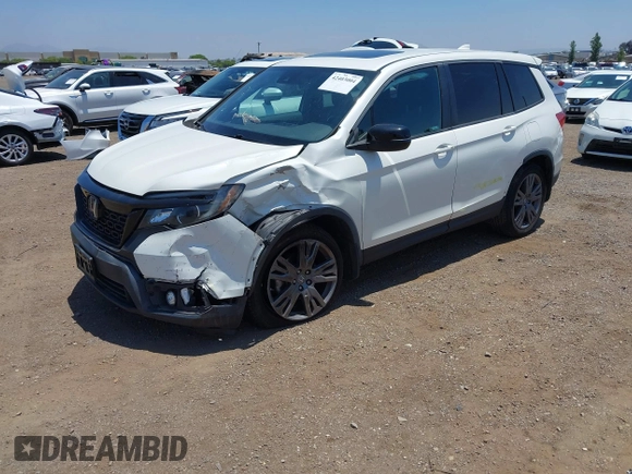 2019 Honda Passport EX-L with VIN 5FNYF7H56KB005380, listed as a IAAI auction lot 42403004 with 76,477 mi miles and . Bid and sale history available at DreamBid. Image 18.