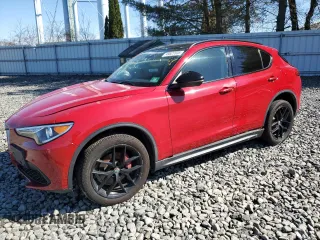 2018 Alfa Romeo Stelvio Sport z VIN ZASFAKPN1J7B80657, wystawiony jako Copart lot #49527035 z przebiegiem 82 321 mil mil oraz Szkody całkowita. Historia ofert i sprzedaży dostępna na DreamBid. Obrazek 1.