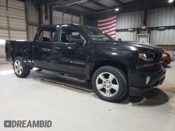 2016 Chevrolet Silverado 1500 LT with VIN 3GCUKREC3GG148667, listed as a Copart auction lot 49725285 with 40,330 mi miles and Salvage Title. Bid and sale history available at DreamBid. Image 4.
