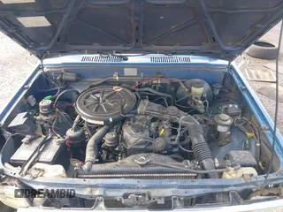 1988 Toyota Pickup with VIN JT4RN50R5J5169942, listed as a IAAI auction lot 42152517 with 218,579 mi miles and . Bid and sale history available at DreamBid. Image 10.