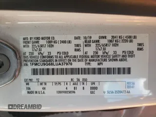 2020 Ford Escape SE z VIN 1FMCU9G68LUA37970, wystawiony jako Copart lot #53059865 z przebiegiem 66 207 mil mil oraz Szkoda całkowita • Salvage title. Historia ofert i sprzedaży dostępna na DreamBid. Obrazek 13.