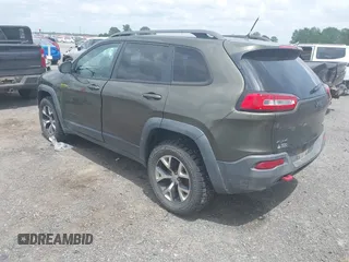 2014 Jeep Cherokee Trailhawk z VIN 1C4PJMBBXEW232210, wystawiony jako IAAI lot #42143917 z przebiegiem 113 603 mil mil oraz . Historia ofert i sprzedaży dostępna na DreamBid. Obrazek 3.